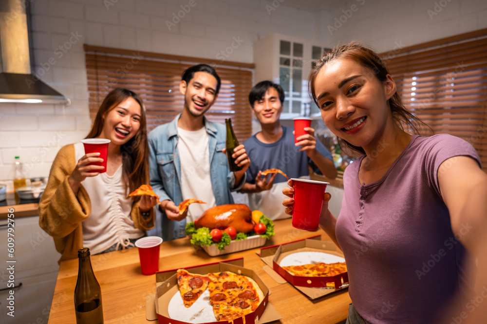 Group of Asian friend having dinner, enjoy evening party together at home. 