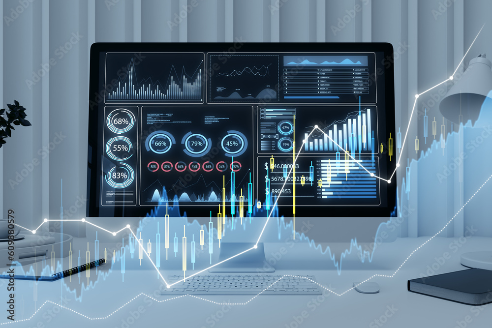 Close up of laptop at workplace with glowing candlestick forex chart on blurry wallpaper. Trade, fin