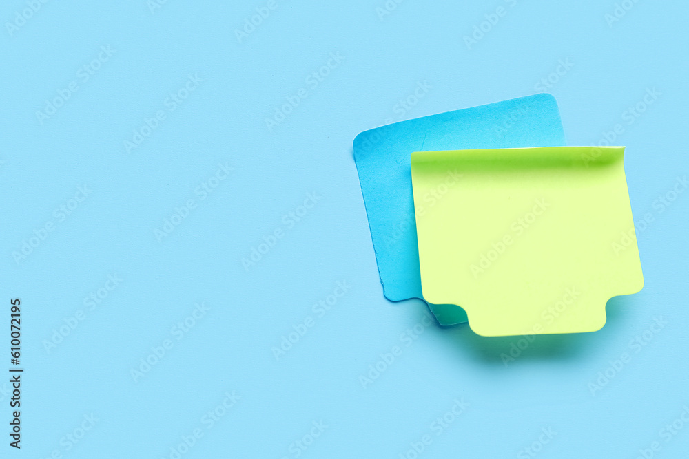 Sticky notes on blue background. Update concept