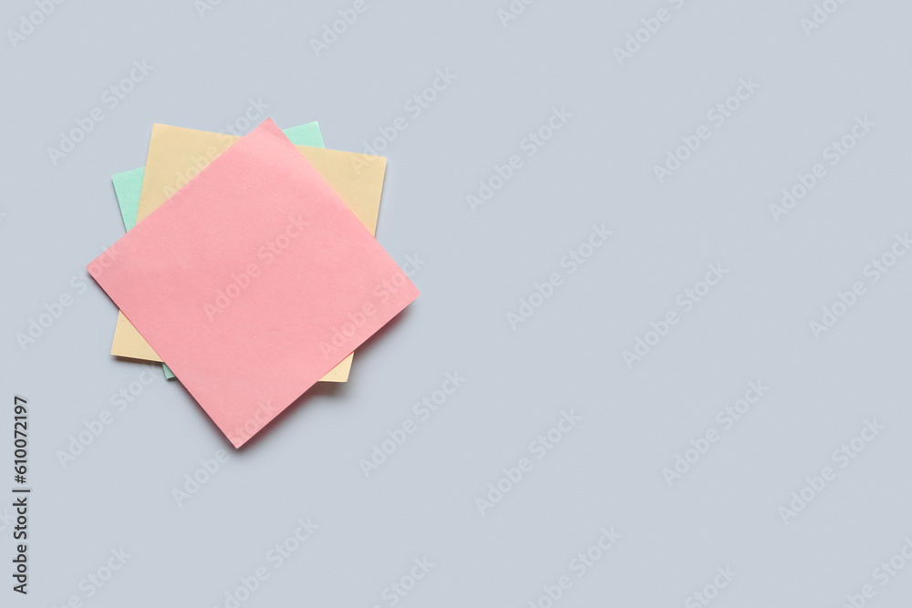 Sticky notes on grey background. Update concept