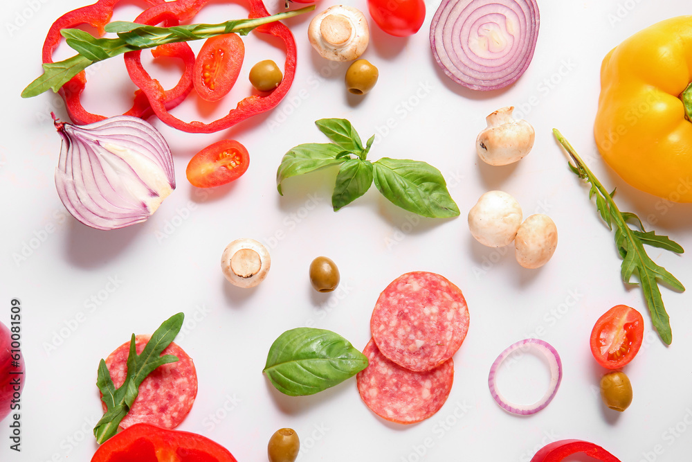 Ingredients for preparing pizza on white background