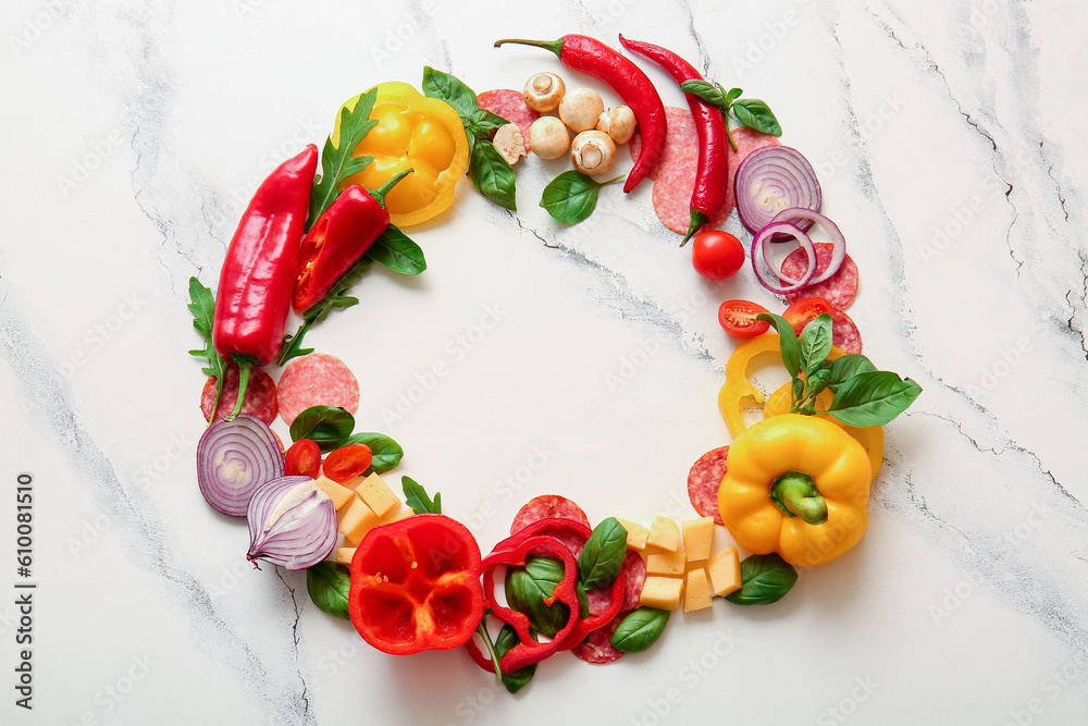 Frame made of ingredients for preparing pizza on white background