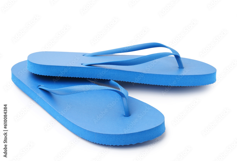 Pair of stylish blue flip-flops on white background