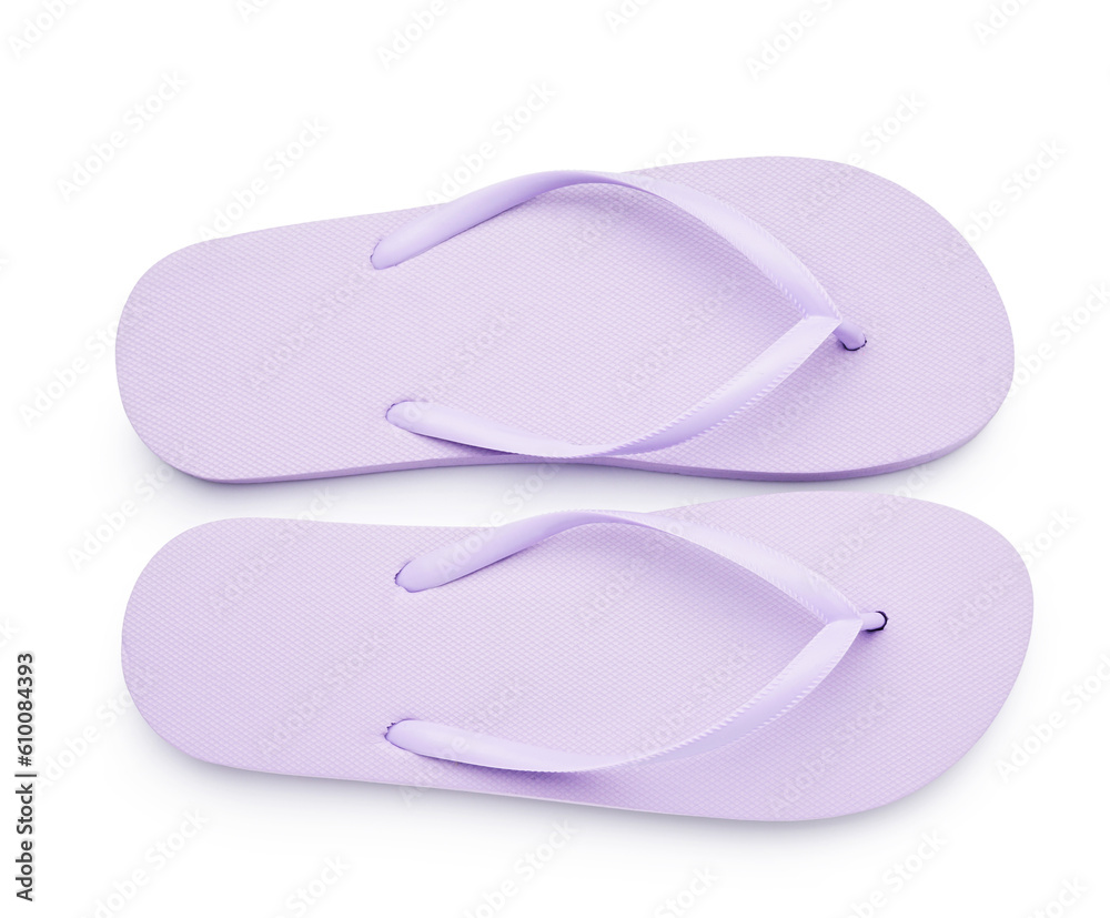 Pair of stylish lilac flip-flops on white background