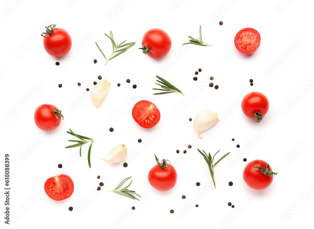 Composition with ripe cherry tomatoes and spices on white background