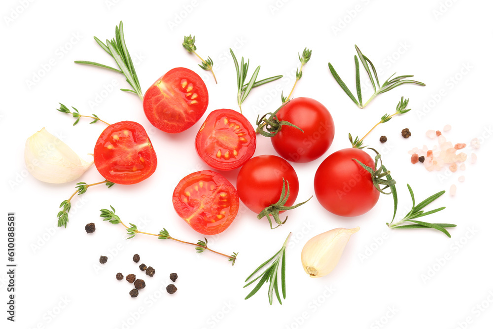 Composition with ripe cherry tomatoes and spices on white background