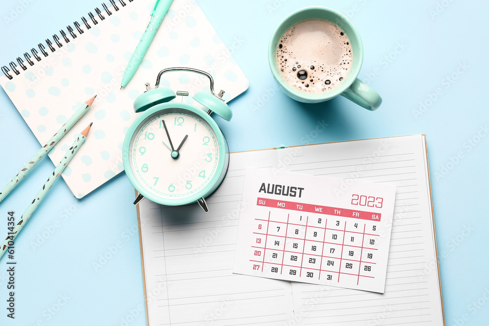 Composition with calendar, alarm clock, cup of coffee and notebook on blue background