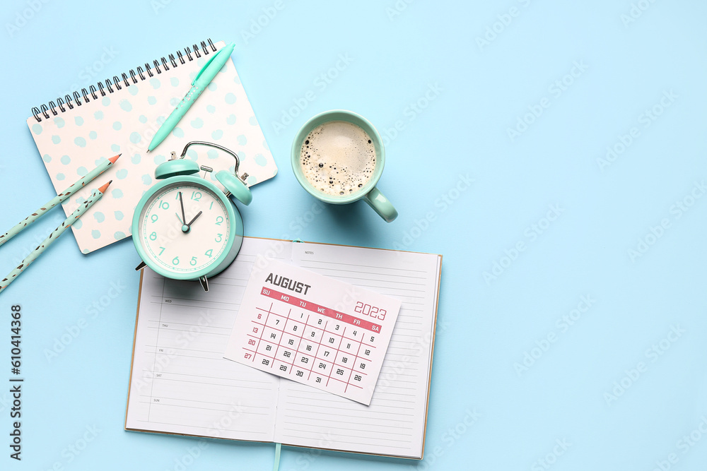 Composition with calendar, alarm clock, cup of coffee and notebook on blue background