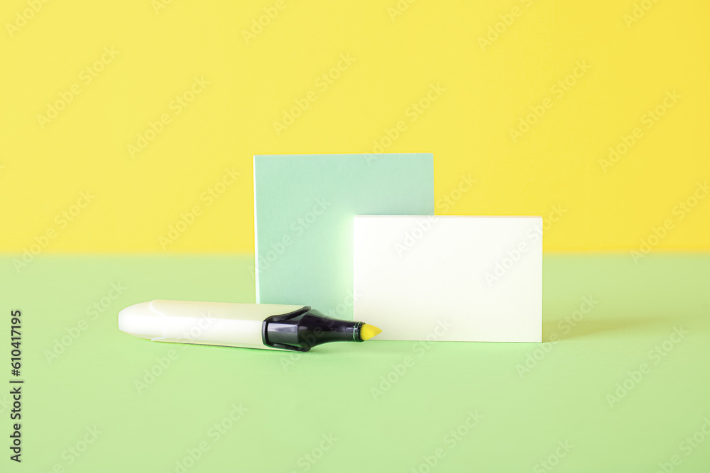 Sticky notes with marker on color background