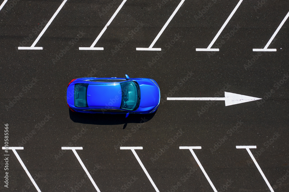 Aerial view of the car and parking lot. Photo from a drone. Markings on the pavement. Transportation