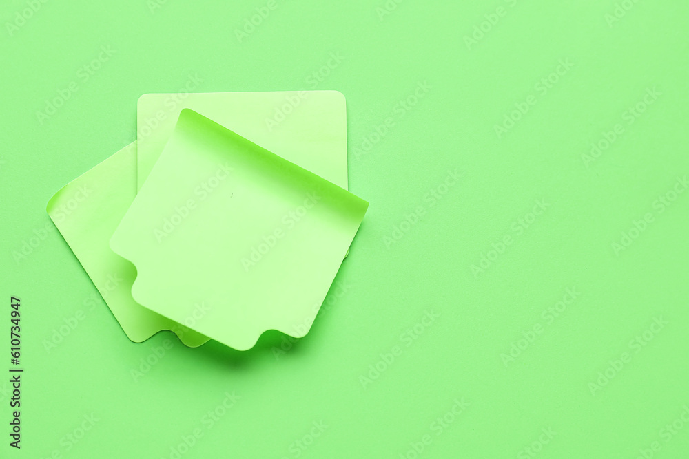 Sticky notes on green background. Update concept