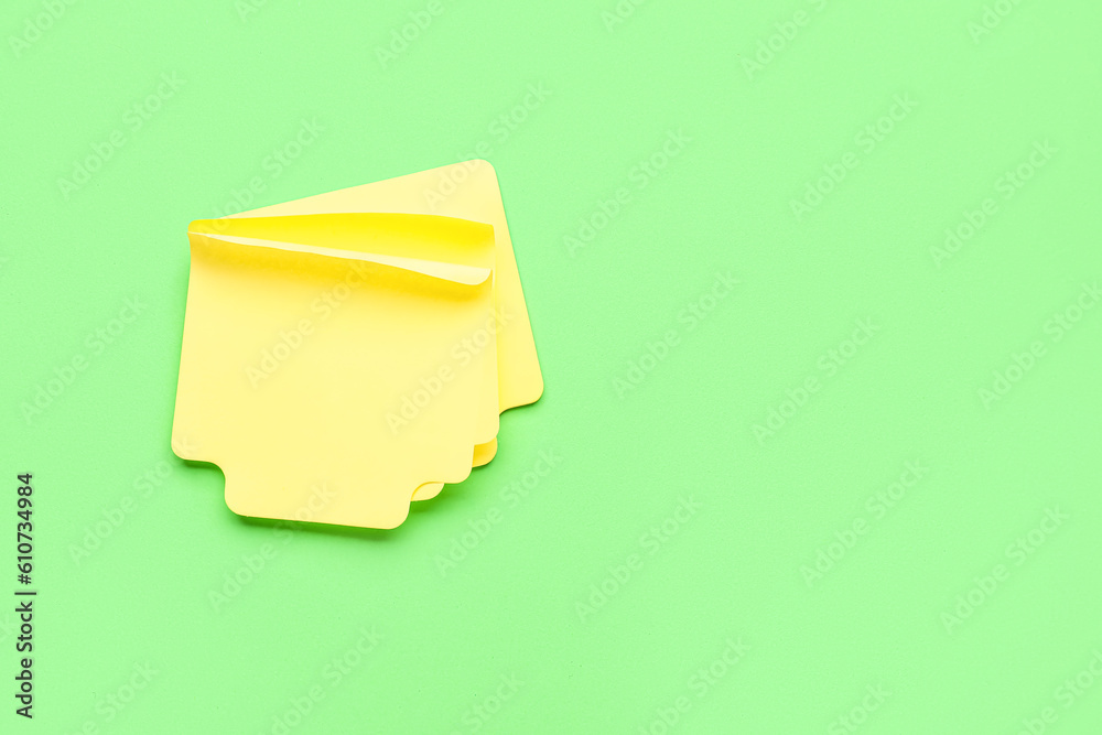 Sticky notes on green background. Update concept