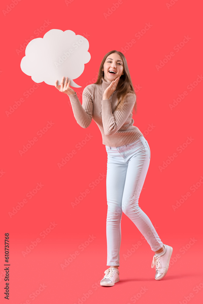 Young woman with blank speech bubble on red background