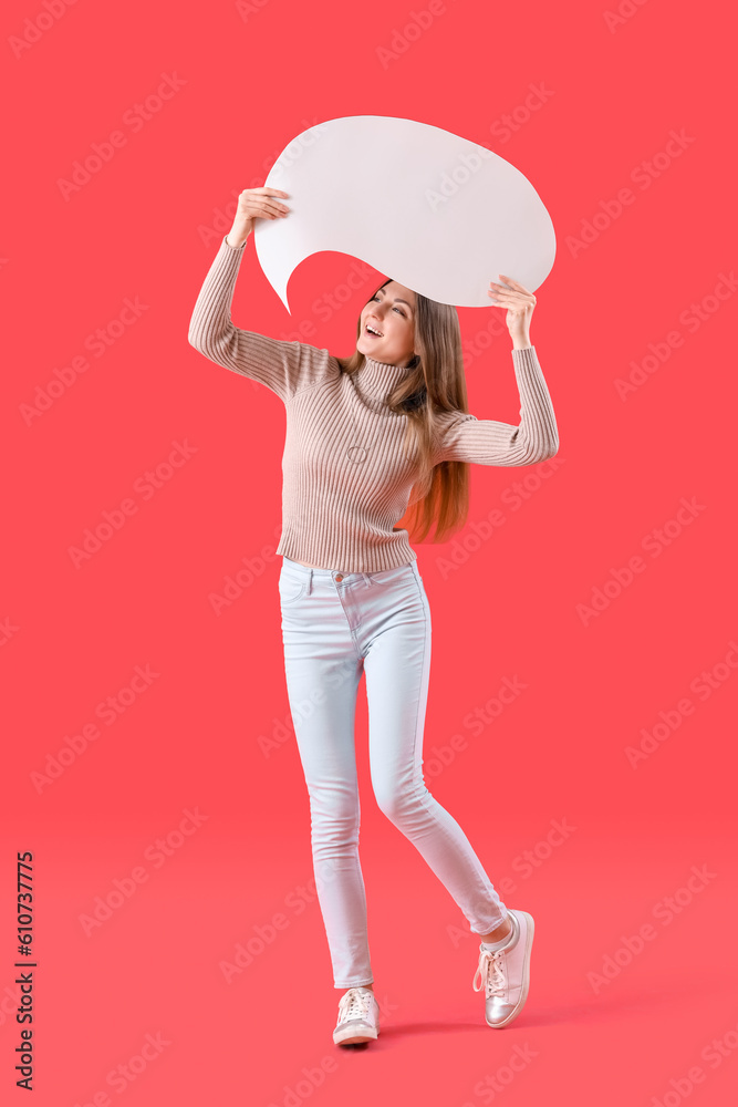 Young woman with blank speech bubble on red background