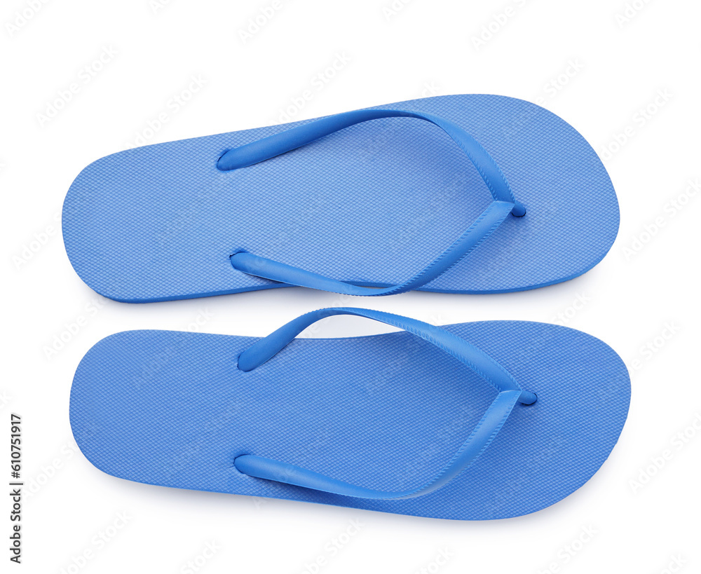 Pair of stylish blue flip-flops on white background