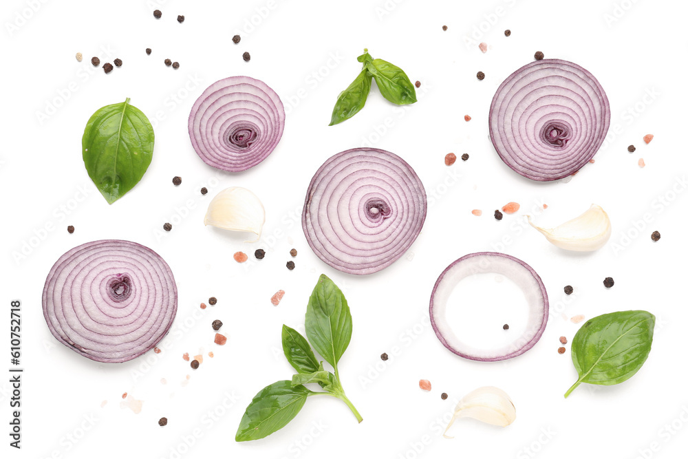 Composition with fresh onion slices and spices on white background