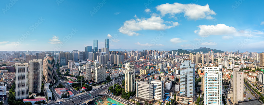 Aerial photo of urban landscape in Qingdao coastal bay area