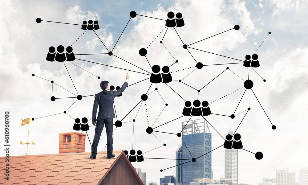 Businessman on house roof presenting networking and connection c