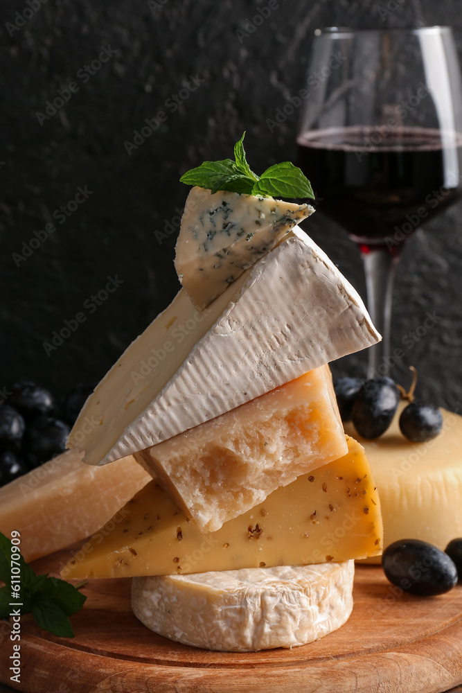 Different types of tasty cheese on table