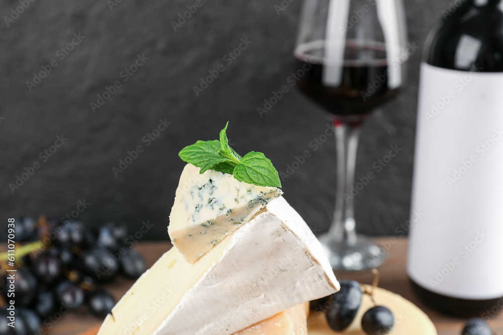 Different types of tasty cheese, closeup