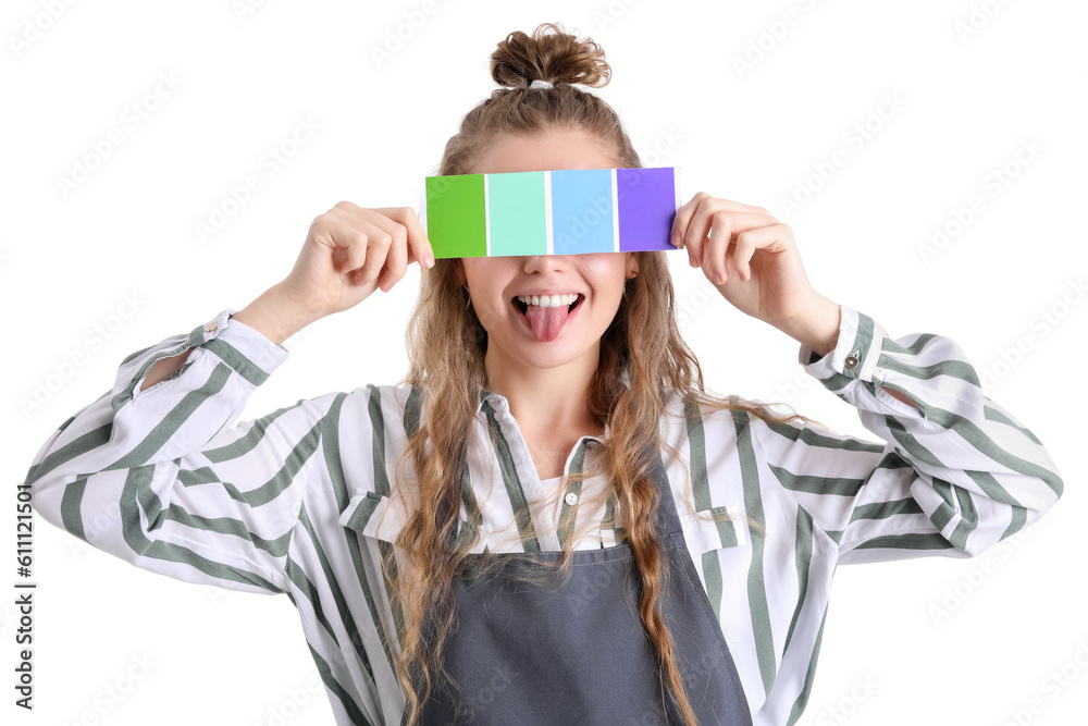 Female artist with paint color palette showing tongue on white background