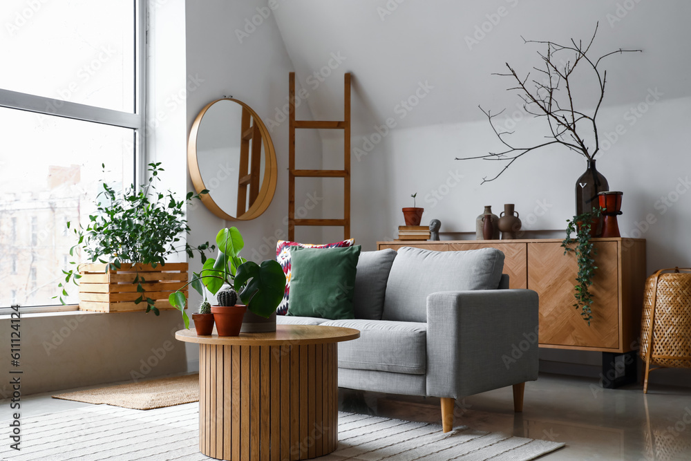 Interior of living room with coffee table and sofa