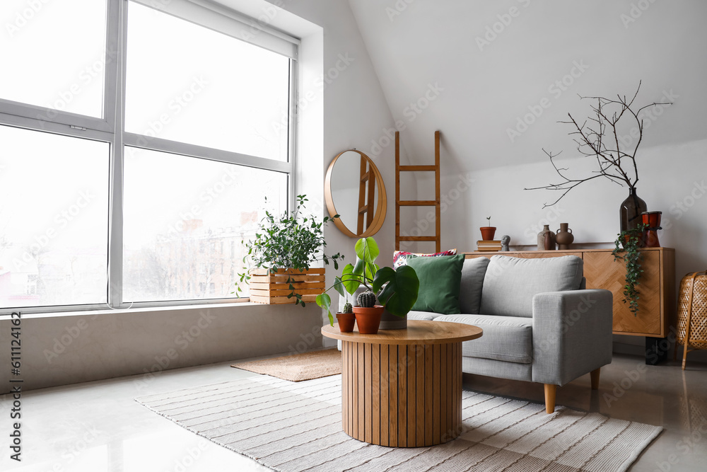 Interior of living room with coffee table and sofa