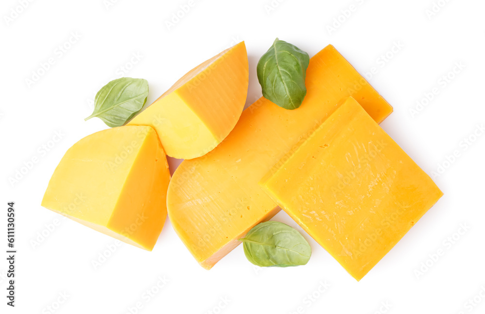 Pieces of tasty cheddar cheese on white background