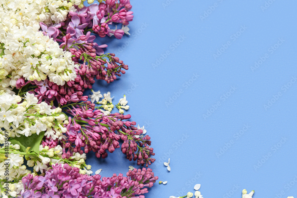 Lilac twigs on blue background