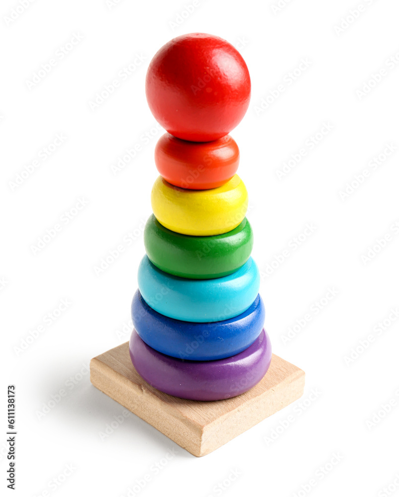 Wooden colorful toy pyramid isolated on white background. Childrens Day celebration