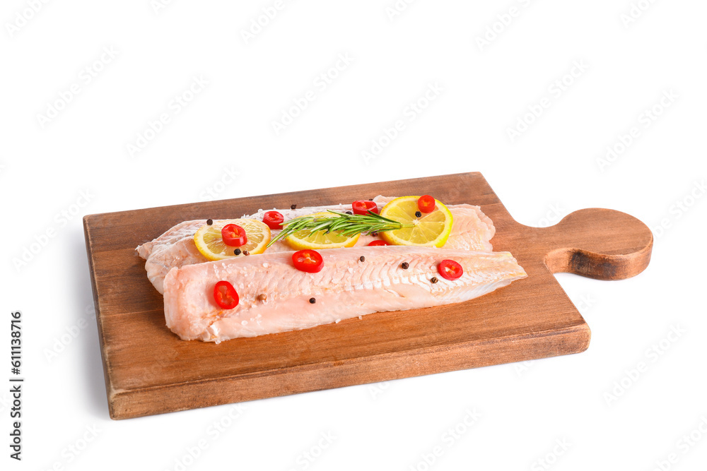 Wooden board with cod fillet on white background