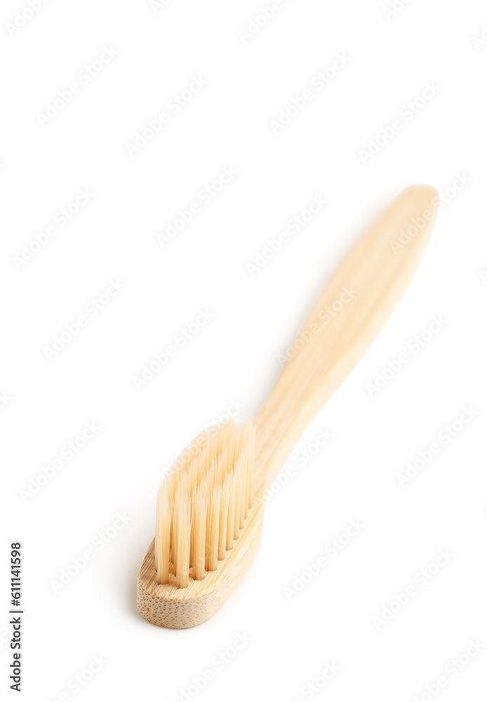 Bamboo toothbrush on white background