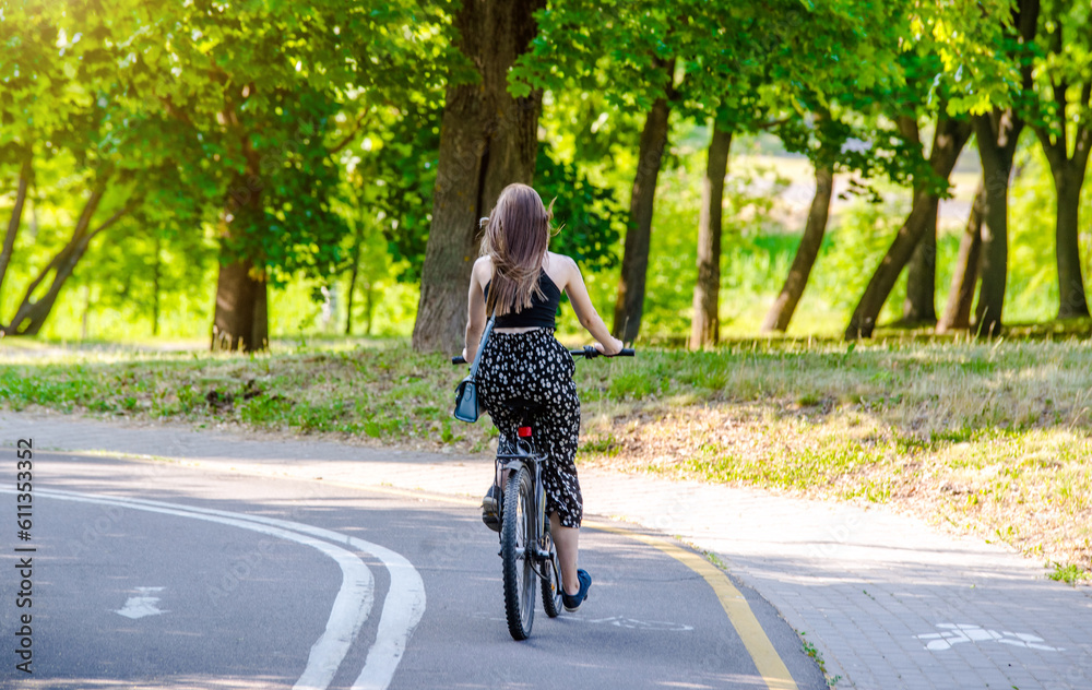 Cyclist ride on the bike path in the city Park 