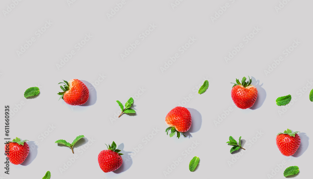 Fresh red strawberries with mints overhead view - flat lay