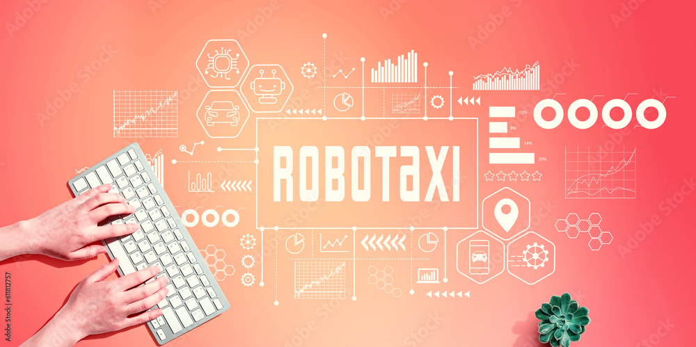 Robotaxi theme with person using a computer keyboard