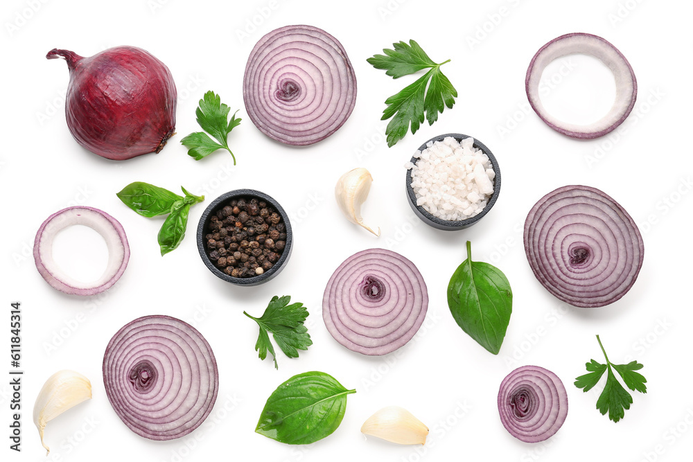 Composition with fresh onion slices and spices on white background