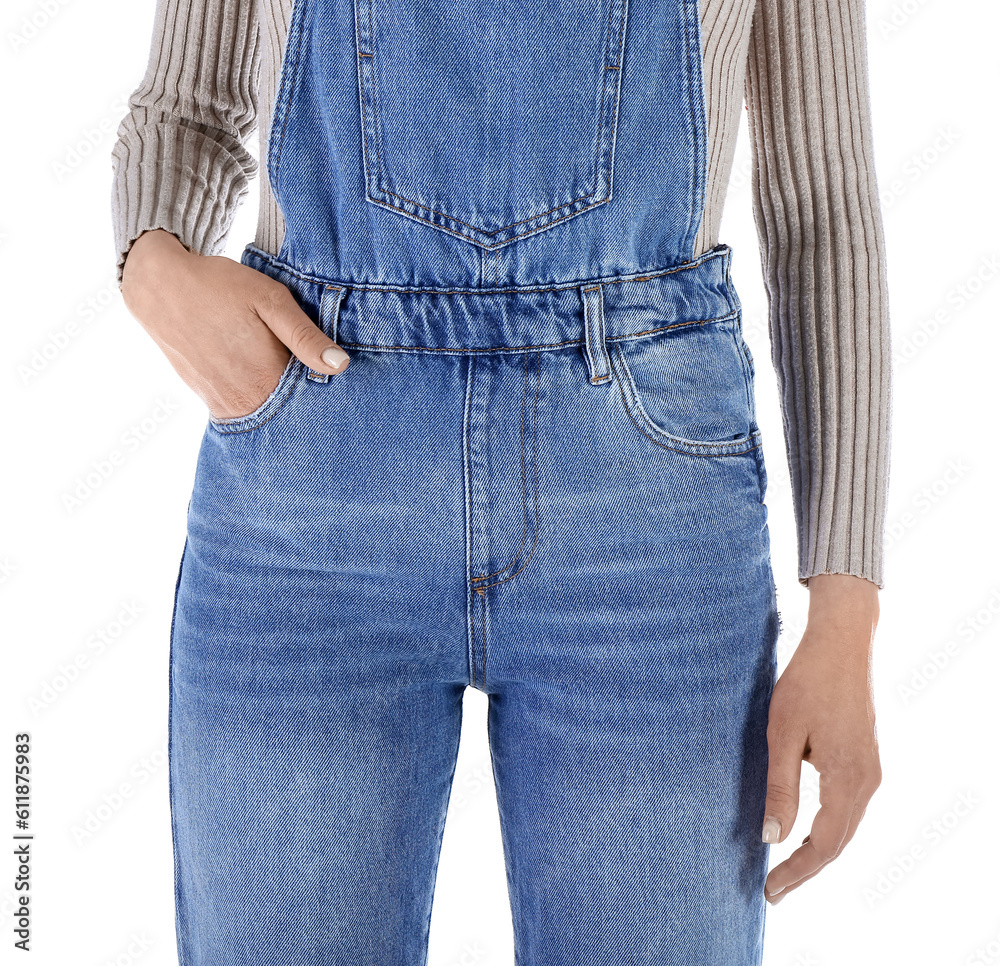 Young woman in denim jumpsuit on white background, closeup