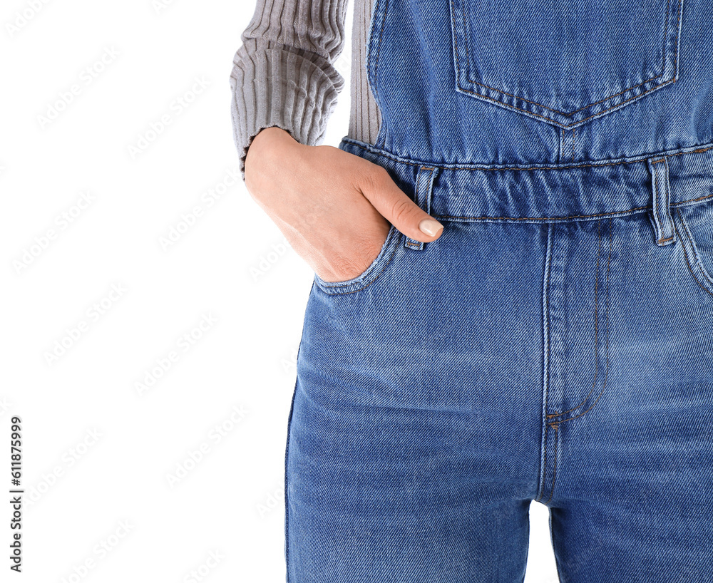 Young woman in denim jumpsuit on white background, closeup