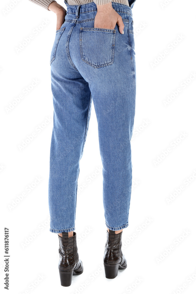 Young woman in denim jumpsuit on white background, back view