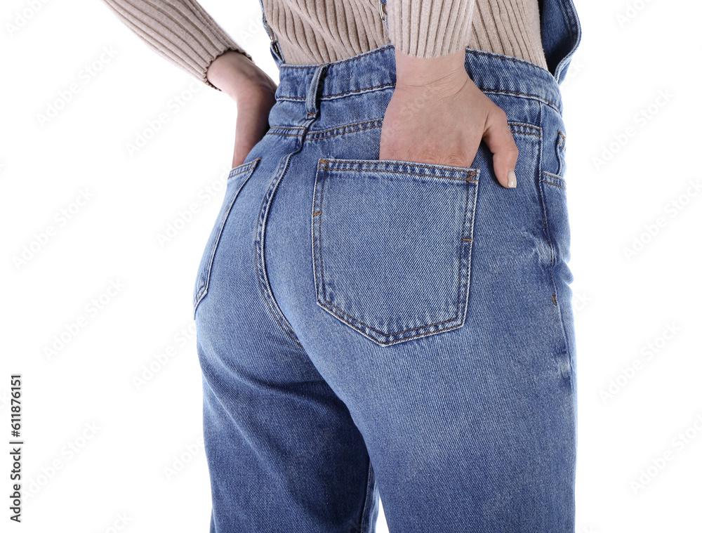 Young woman in denim jumpsuit on white background, back view