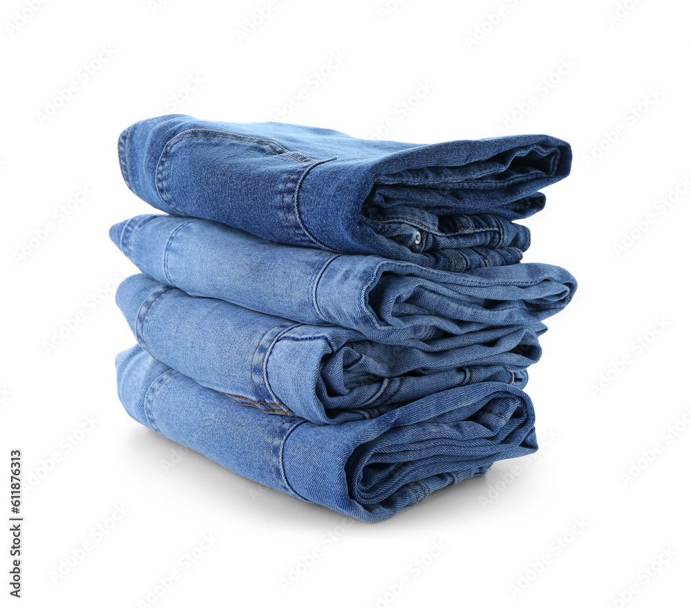 Stack of jeans on white background