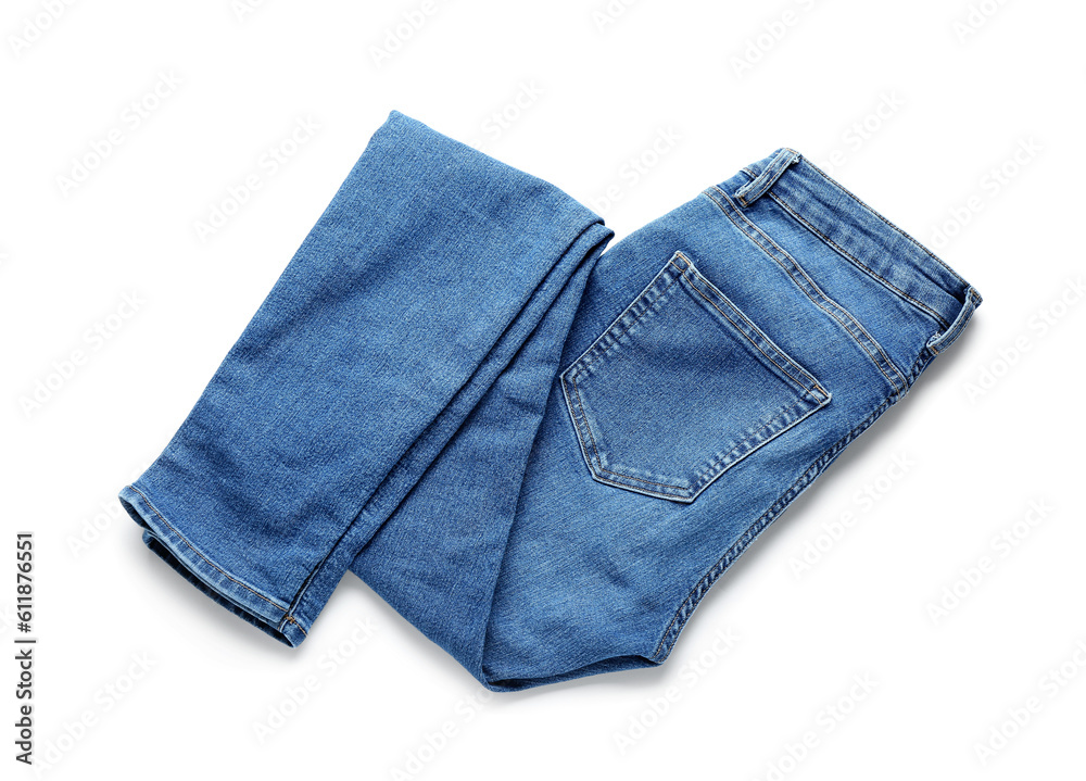 Folded jeans on white background