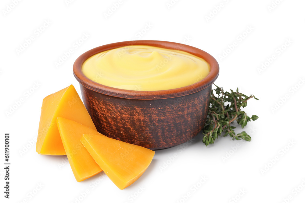 Bowl with tasty cheddar sauce, chunks of cheese and rosemary on white background