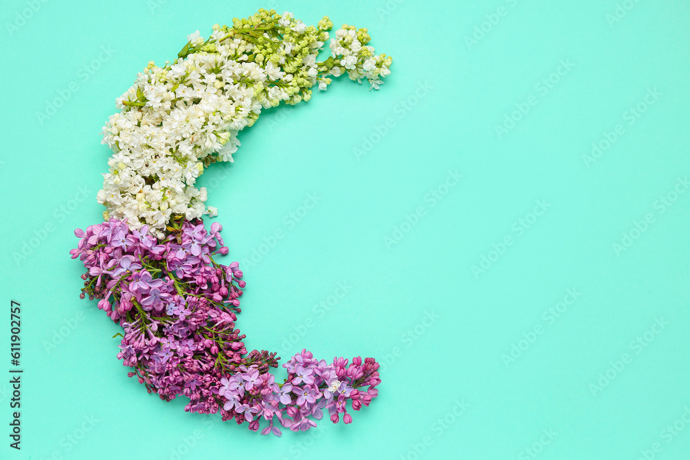 Lilacs in shape of moon on turquoise background