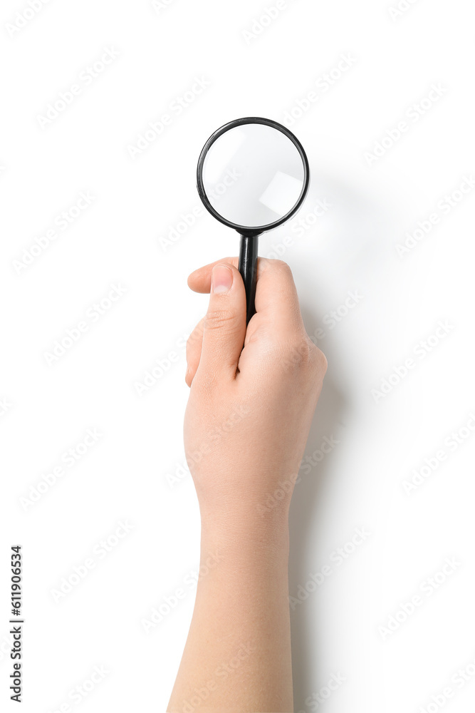 Female hand with mini magnifier isolated on white background