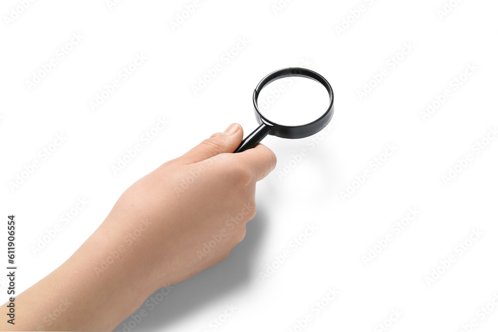 Female hand with mini magnifier isolated on white background