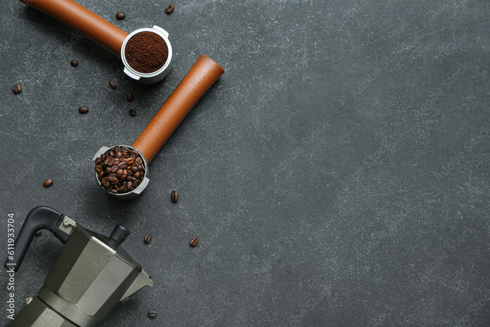 Geyser coffee maker, portafilters with coffee beans and powder on dark background