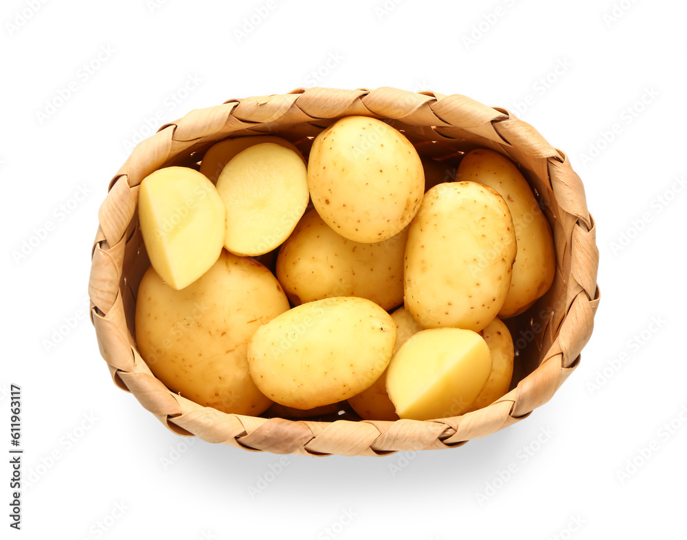 Wicker basket with raw baby potatoes on white background