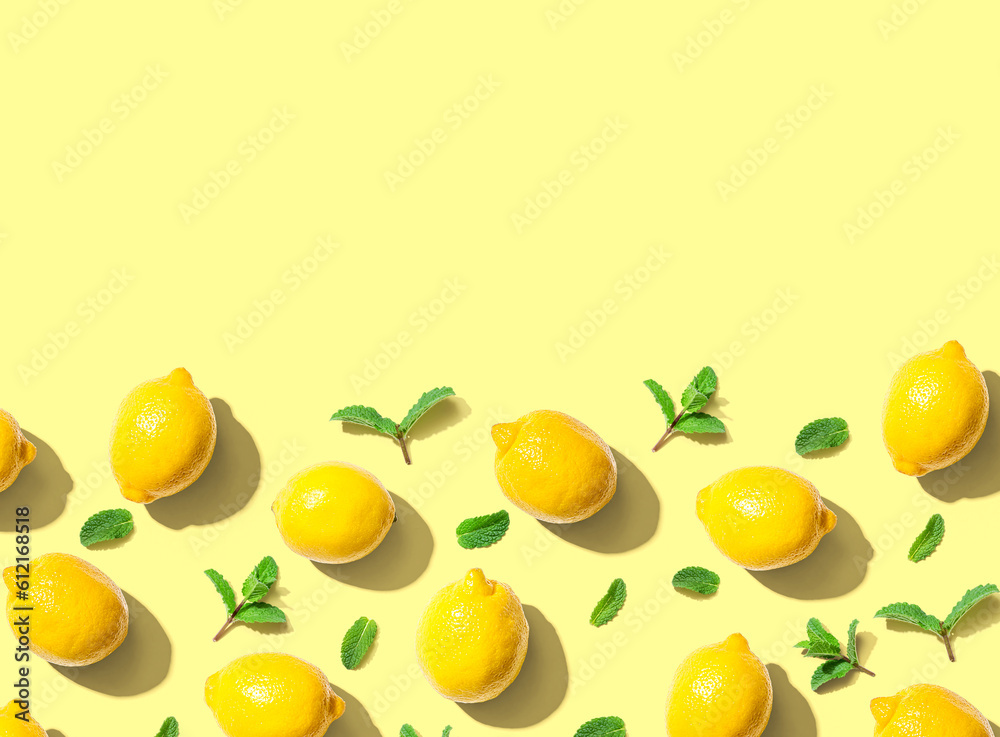 Fresh yellow lemons with mints overhead view - flat lay