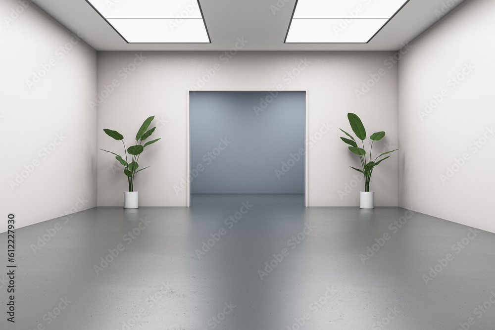 Contemporary gallery interior with concrete flooring and reflections, arch, decorative plant and bri